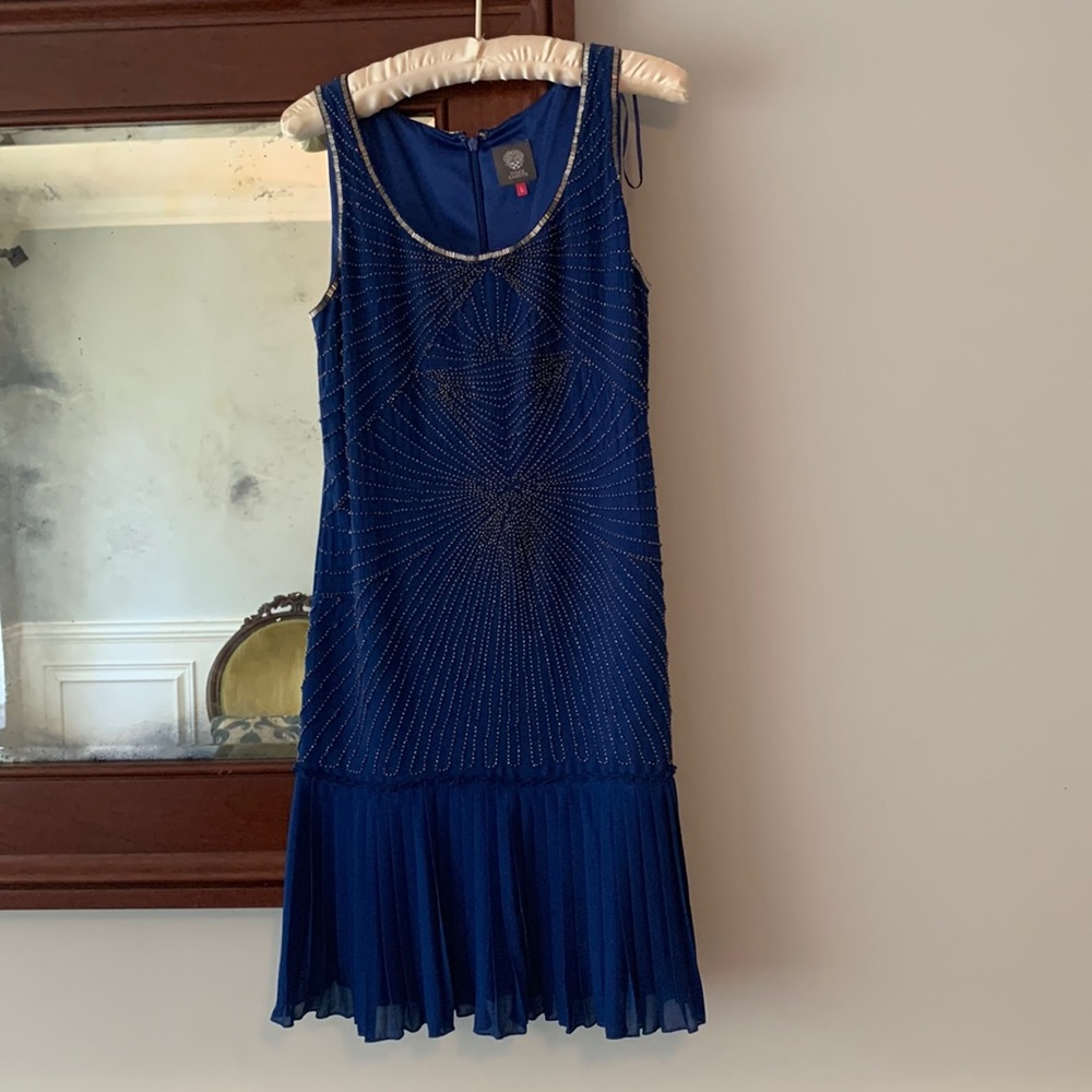 Party dress, in the style of the 1920’s. Unique and flattering. Showstopper!